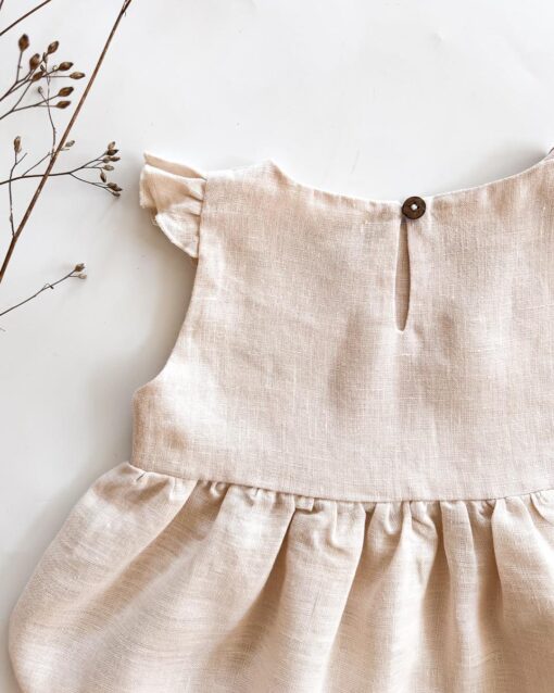 Sofortkauf: Leinenkleid mit Flügelärmeln in Wollweiß, Gr. 86/92 – Bild 2