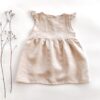 Sofortkauf: Leinenkleid mit Flügelärmeln in Wollweiß, Gr. 86/92