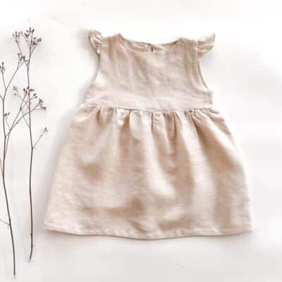 Sofortkauf: Leinenkleid mit Flügelärmeln in Wollweiß, Gr. 86/92