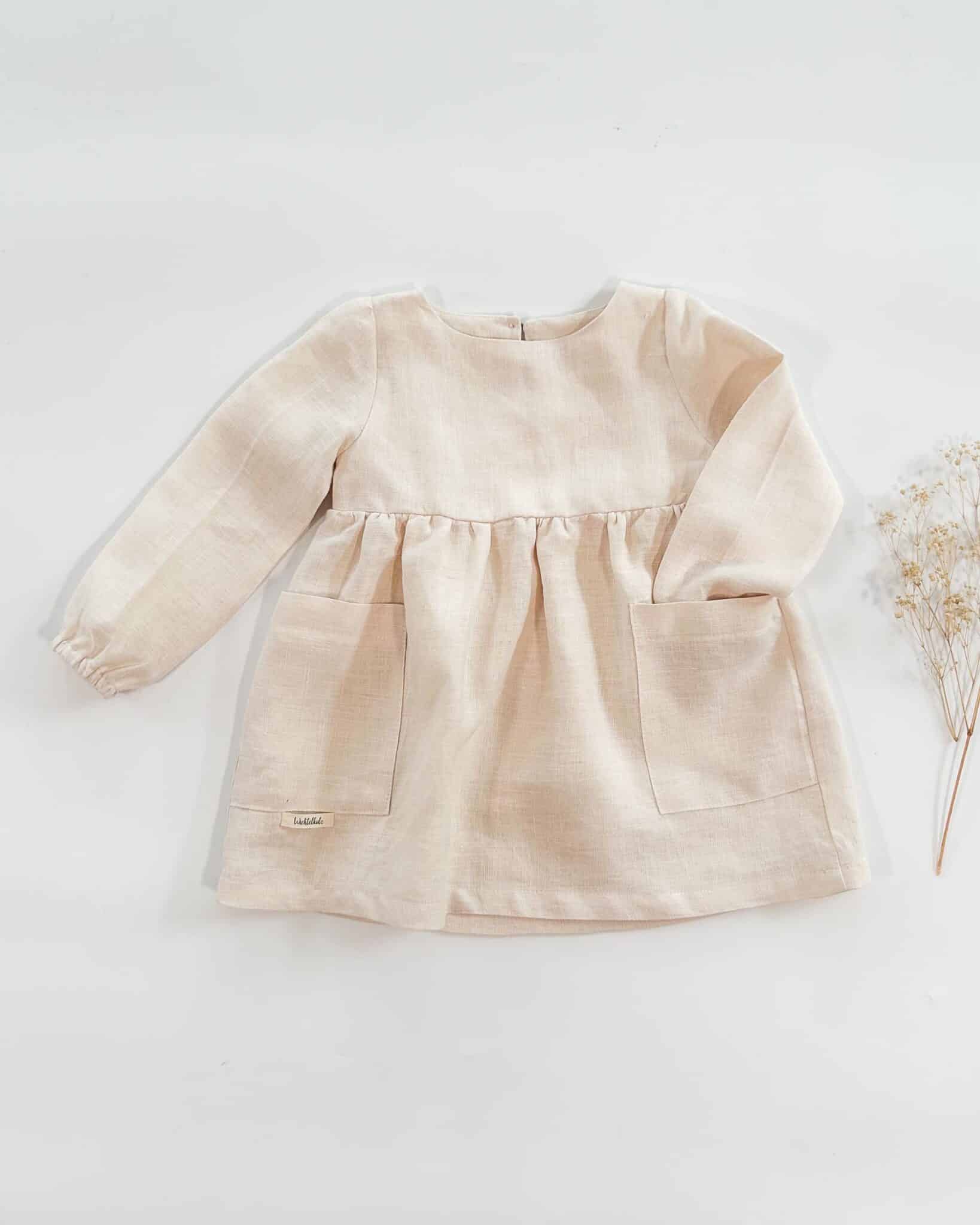 Sofortkauf: Leinenkleid langarm und Taschen in Wollweiß, Gr. 86/92