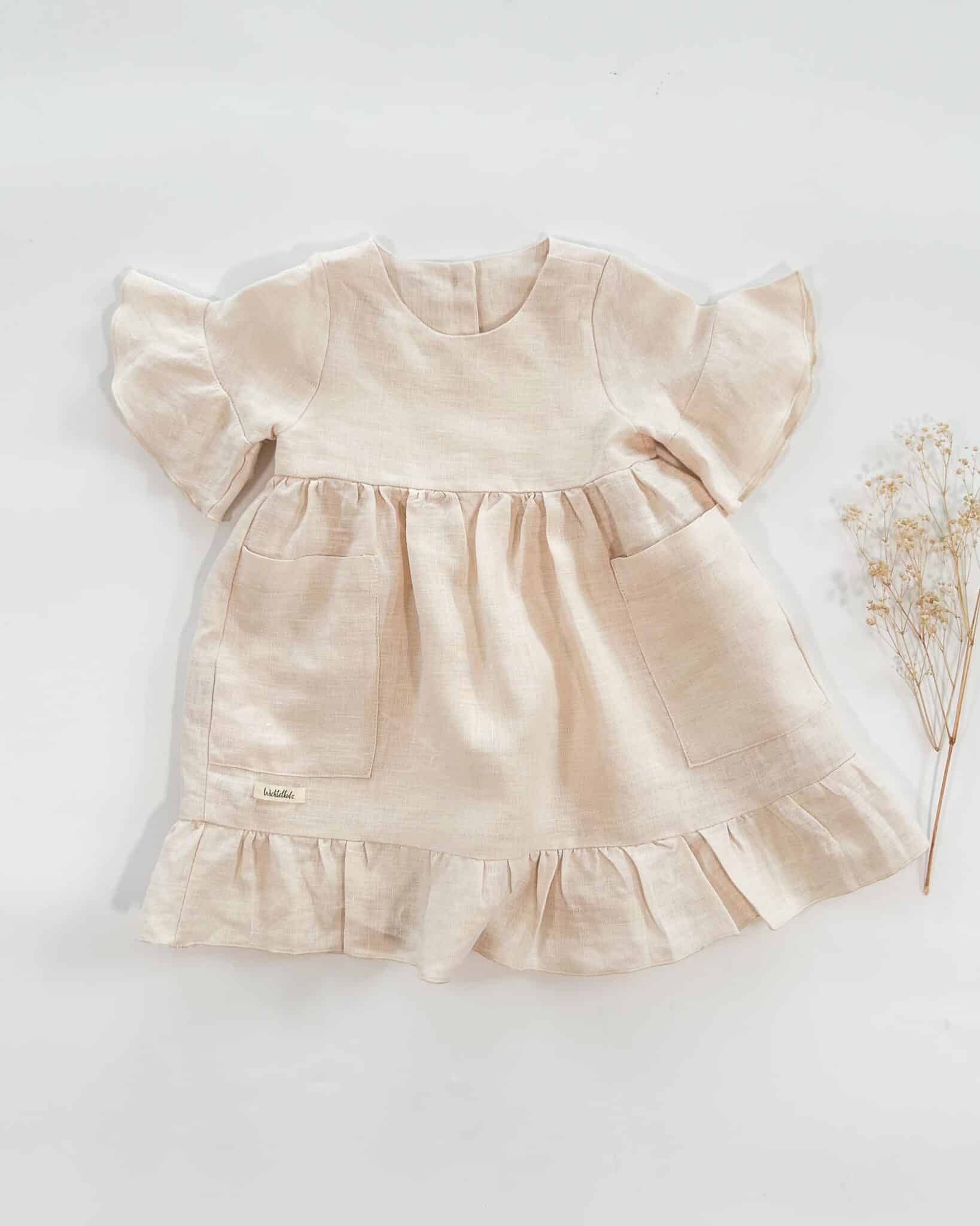 Sofortkauf: Mädchen Volantkleid aus Leinen in Wollweiß, Gr. 86/92