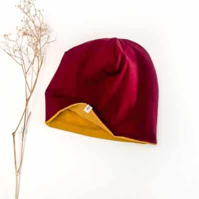 Sofortkauf: Wende-Beanie Beere/Senf Gr. 50-52