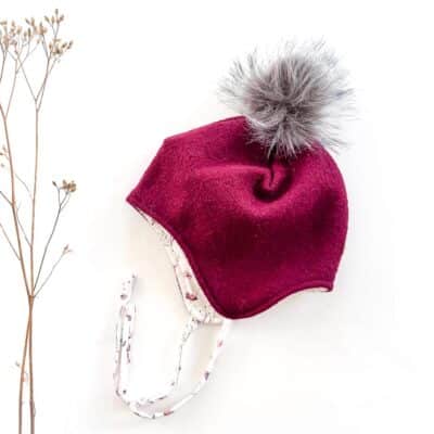 Sofortkauf: Wollwalk Bommelmütze in Beere/Norwegian Flowers, Gr. 50-52