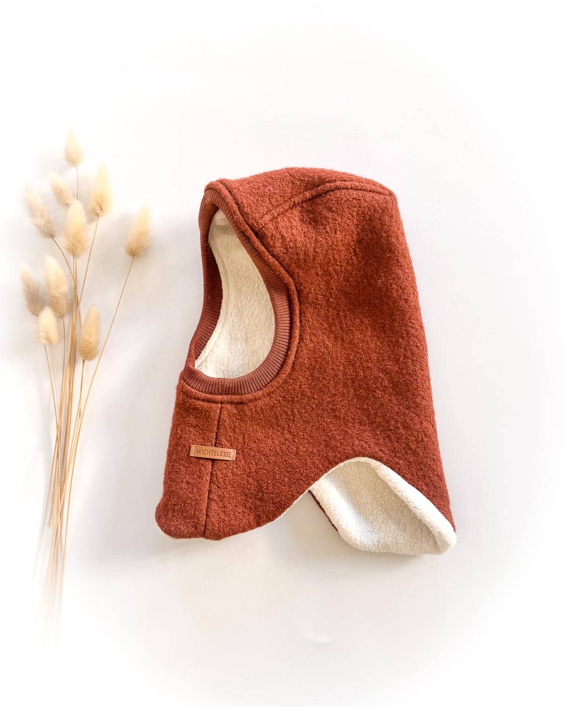 Sofortkauf: runde Wollwalk Schlupfmütze Rost/Kuschelfleece Creme, Gr. 48-50